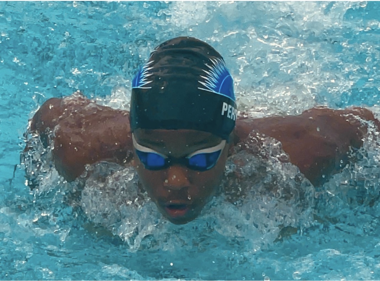 Kira Perry swimming butterfly